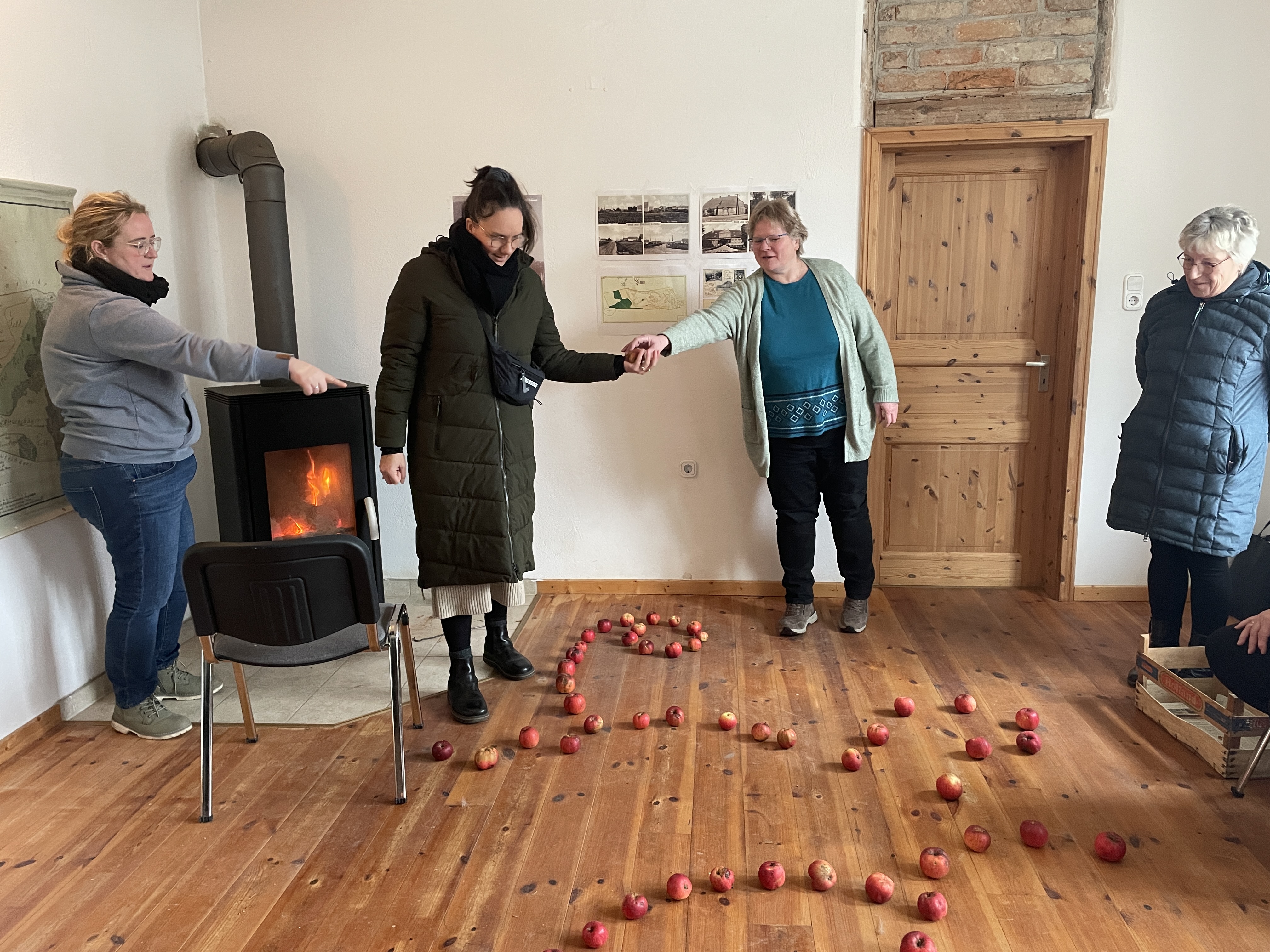 Commissioners plan their paths along an apple ornament